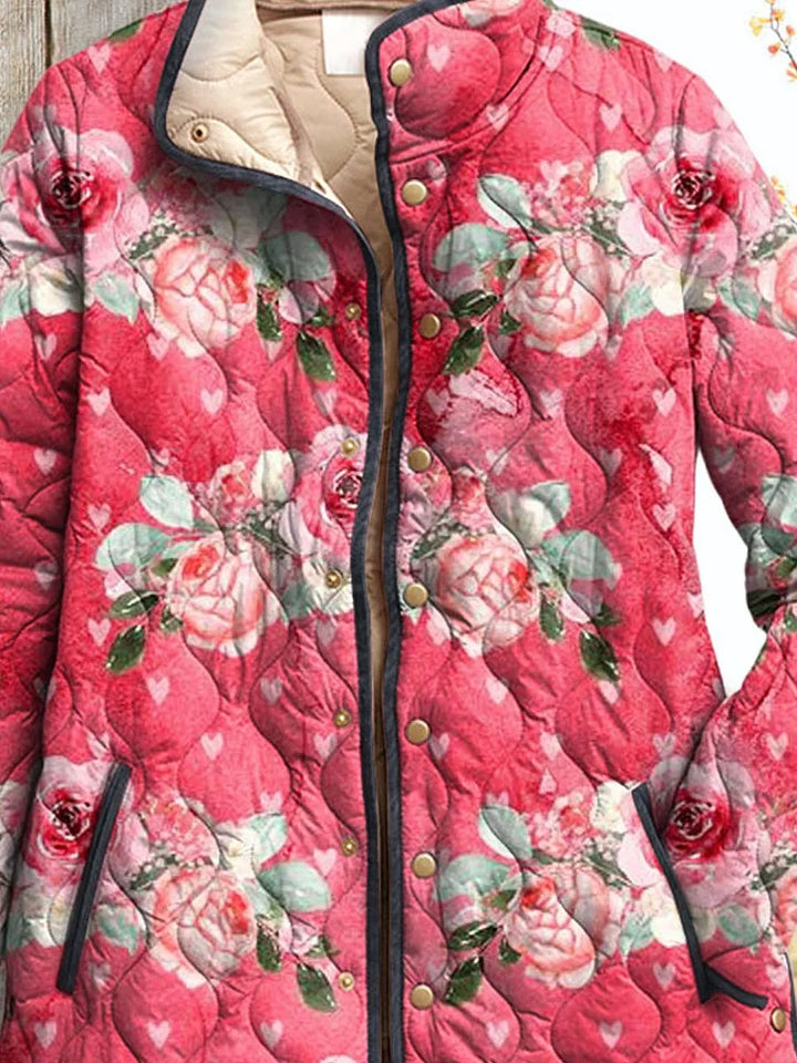 Giacca Trapuntata Rosa con Stampa Floreale Elegante