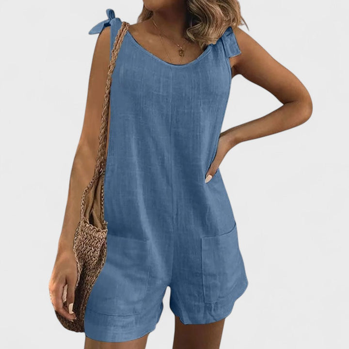 Maia - Tuta corta con tasche sulle spalle e lacci