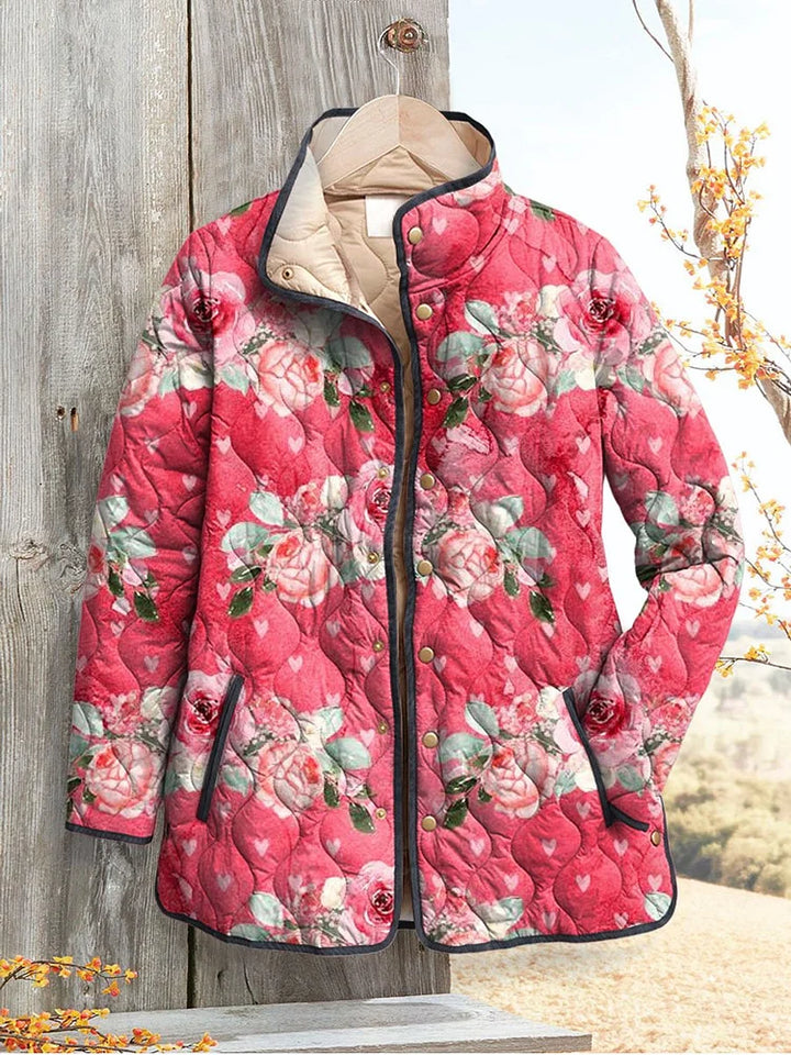 Giacca Trapuntata Rosa con Stampa Floreale Elegante